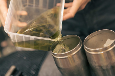 Detail of a cocktail mixology tasting event, no people are recognizable.