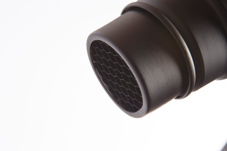 Close-up of a black pipe on a white background. Isolated