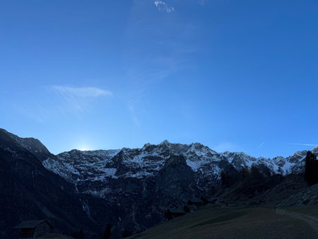 Mountains in the Alps with blue sky and clouds, Switzerland.