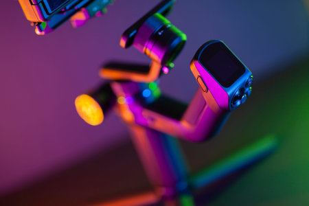Close up on a modern gimbal for videomaking, background is black.の写真素材
