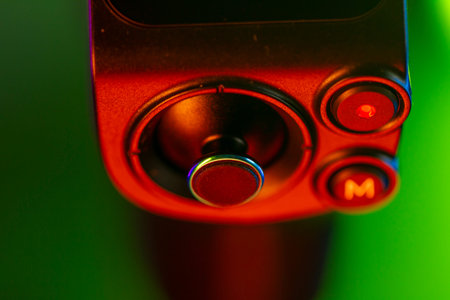 Close up on a modern gimbal for videomaking, background is black.