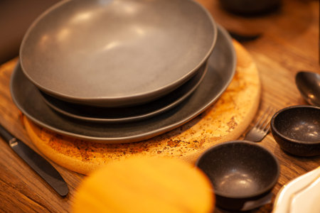 Close up on a table with luxury crockery, no people are visible.