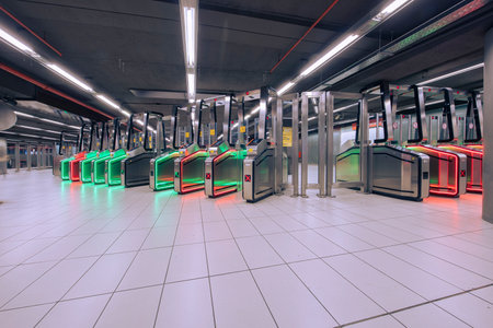 Milan, Italy - September 28, 2024: subway interior shot of the new access turnstiles for the Piazza del Duomo underground trains.の写真素材