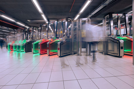 Milan, Italy - September 28, 2024: subway interior shot of the new access turnstiles for the Piazza...