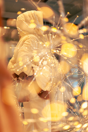 Christmas clothing shop windows details, no people are visible.の写真素材