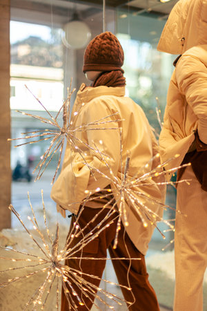 Christmas clothing shop windows details, no people are visible.の写真素材