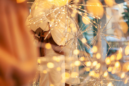 Christmas clothing shop windows details, no people are visible.の写真素材