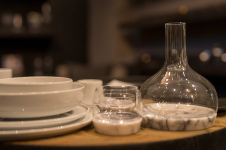 Close up on luxury tableware, dishes and glasses.