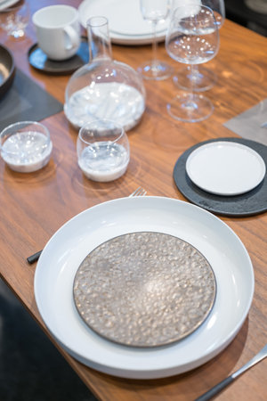 Close up on luxury tableware, dishes and glasses.