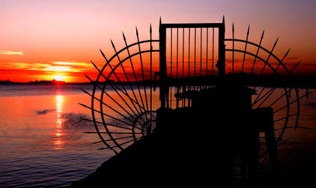 The door to the mystery. Gateway gets dark after the old wharf.の写真素材