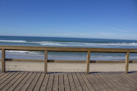 wooden terrace on the beach with a beautiful view of the Mediterranean sea