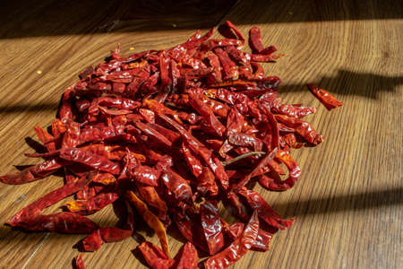 Gastronomic photo with natural light of Mexican tree peppers, one of the most spicy in the world. photo with lightの写真素材