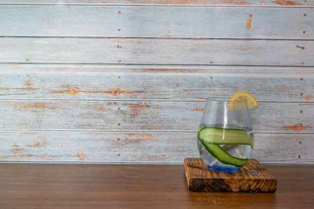 mixology concept with cocktail with cucumber and lemonの写真素材