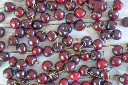 background of fresh cherries on vintage trablas