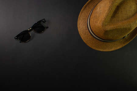 men's fashion background with hat and sunglassesの写真素材