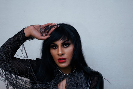 portrait of transgender latina wearing an exotic drag queen costume. transsexual