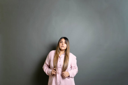 plus size young latin woman with long hair