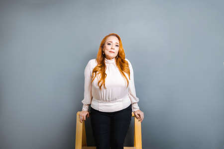 executive and fashion photography of elegant and beautiful business woman looking at the cameraの写真素材