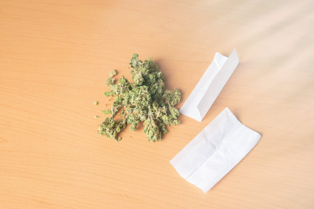 marijuana and cigarette paper as a pain treatment