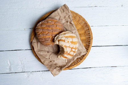 vita top of vanilla and chocolate shells. traditional mexican bread, bittenの写真素材