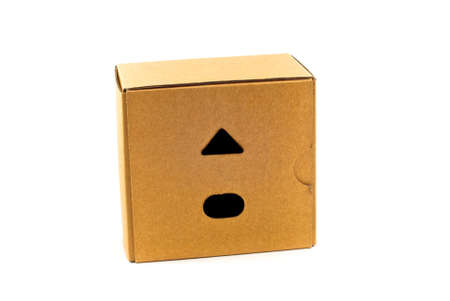 Closed paper box lying on white background,isolatedの写真素材