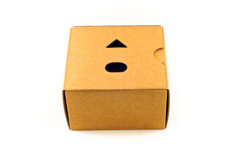 Closed paper box lying on white background,isolatedの写真素材
