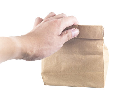holding paper bag on white background,isolatedの写真素材
