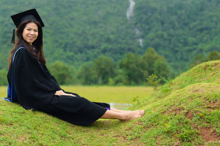 Portrait of Asian female graduate in Thailandの写真素材