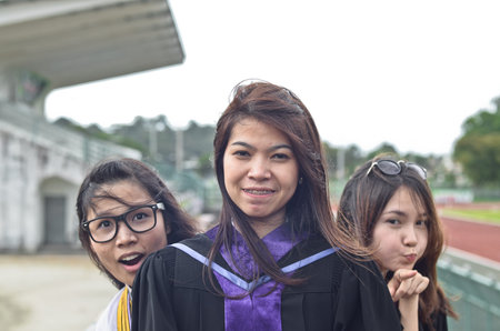 Portrait of Asian female graduate in Thailandの写真素材