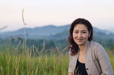 Pretty woman enjoying natureの写真素材