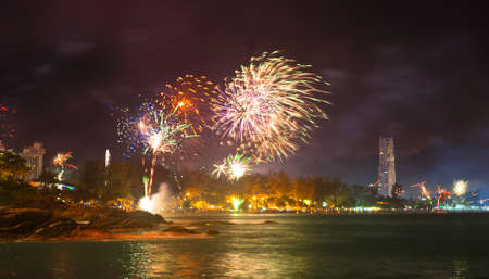 beautiful fireworks celebrating new year on patong beach thailandの写真素材