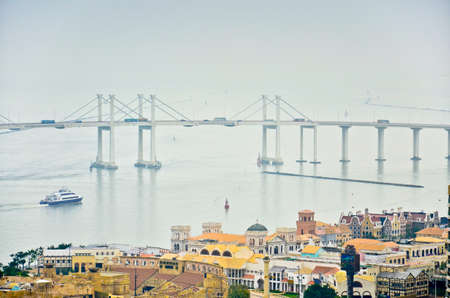 A sea view with jetfoil and a vesselの写真素材