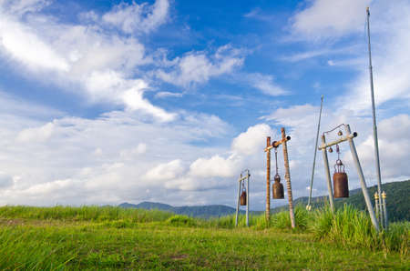 Grass Mountain and blue sky background located in Ranong, Thailandの写真素材