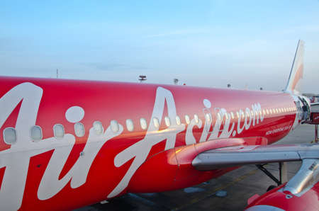 BANGKOK - MAY 8: AirAsia's aircrafts at Dong Muang Airport, Bangkok, Thailand on May 8, 2013. AirAsia is Asia's largest low-cost carrier, no-frills airline and a pioneer of low-cost travel in Asia.のeditorial素材