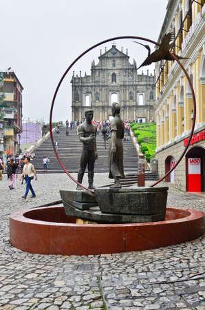 MACAU-MAY 9 : Tourists visit the Historic Centre of ruined church of St Paul on May 9, 2013 in Macau, China. The ruined church of St Paul was inscribed on the UNESCO World Heritage List in 2005.のeditorial素材
