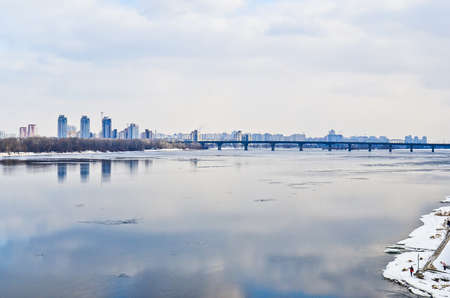 view from the river Dnieper, skyscrapers and bridge Paton, Kyiv, Ukraineの写真素材
