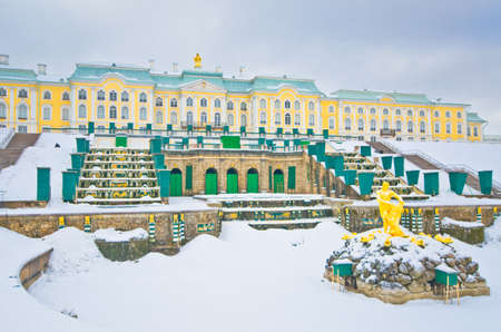 PETERHOF, RUSSIA - MARCH 5:The Grand Cascade and fountain in Peterhof palace on March 5, 2012 in Peterhof, Russia. The fountains of the Grand Cascade are located below the grotto and on either side of it.のeditorial素材