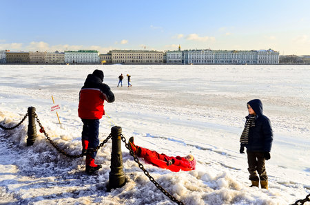 ST. PETERSBURG - CIRCA MARCH 2013: Frozen Neva River in St. Petersburg, circa March 2013. A popular tourist destination with 221 museums, 2000 libraries, and 80 plus theaters within the city.のeditorial素材