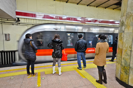 BEIJING, CHINA - FEB 20: Beijing subway interior on February 20, 2012 in Beijing, China. Beijing subway system is the oldest in mainland China operated since 1969.のeditorial素材