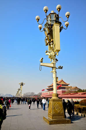 BEIJING - FEB 20: Early morning tourists start to flock at Tian An Men Square on February 20, 2012 in Beijing, China. Tiananmen Square is the third largest city square in the world.のeditorial素材
