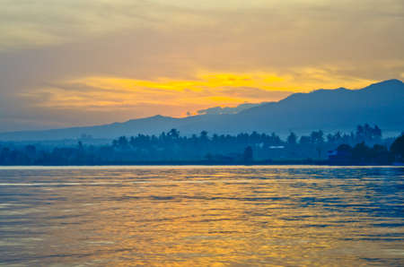 sunrise at Lovina beach Bali Indonesiaの写真素材