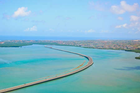 Aerial view of Denpasar on Bali showing buildings and bridgeの写真素材