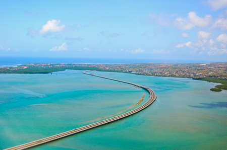 Aerial view of Denpasar on Bali showing buildings and bridgeの写真素材