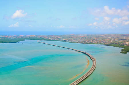 Aerial view of Denpasar on Bali showing buildings and bridgeの写真素材
