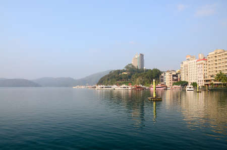 SUN MOON LAKE - OCT 25: many boats parking at the pier on October 25, 2013 at Sun Moon Lake, Taiwan. Sun Moon Lake is the largest body of water in Taiwan as well as a tourist attraction.のeditorial素材