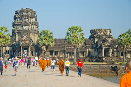 SIEM REAP, CAMBODIA - JAN 04: Monks  in Angkor Wat temple, January 04, 2014, Siem Reap, Cambodia. Buddhism is currently estimated to be the faith of 96% of the Cambodian population.のeditorial素材