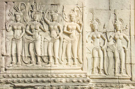 Relief of three dancers in the court of Angkor. Angkor Watの写真素材