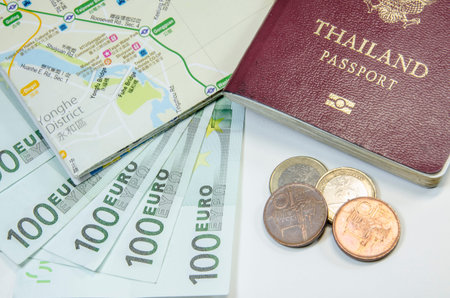 passport with bank notesの写真素材