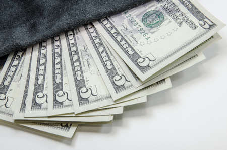 dollars, money in bag on white backgroundの写真素材