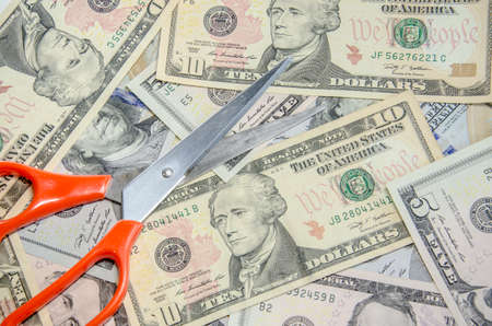 scissors cutting dollarの写真素材